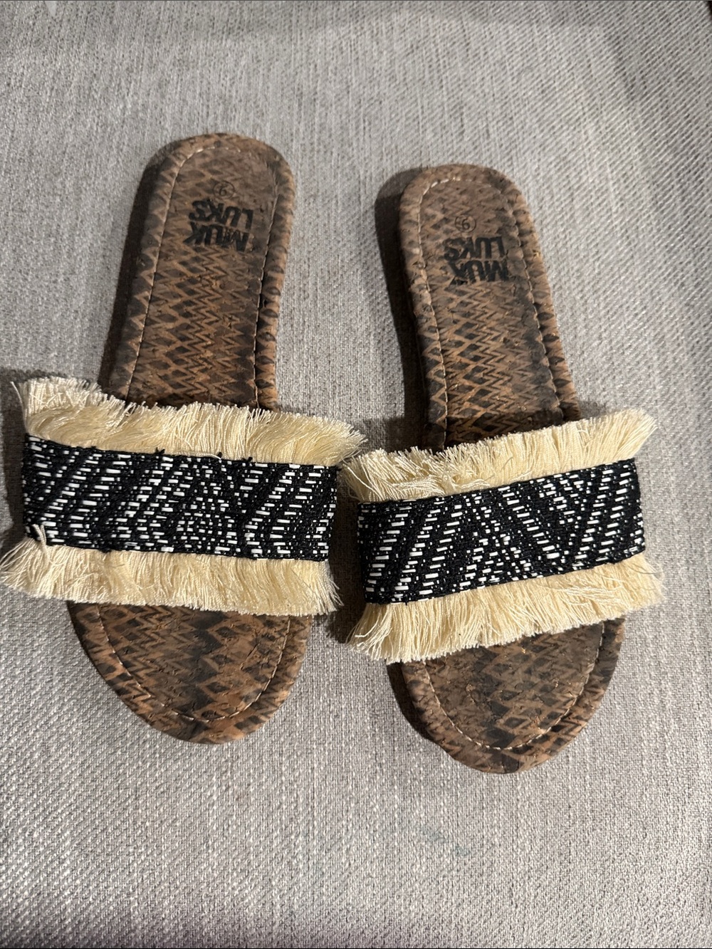Muk Luks Black and Cream Fringe Slide Sandals